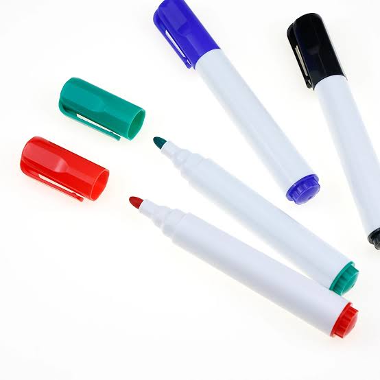 Markers with blue, black, green and red caps